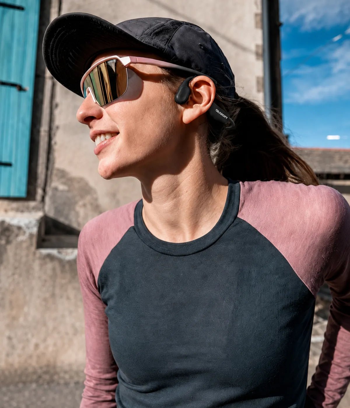 Runner wearing GWS CURRENT headphones
